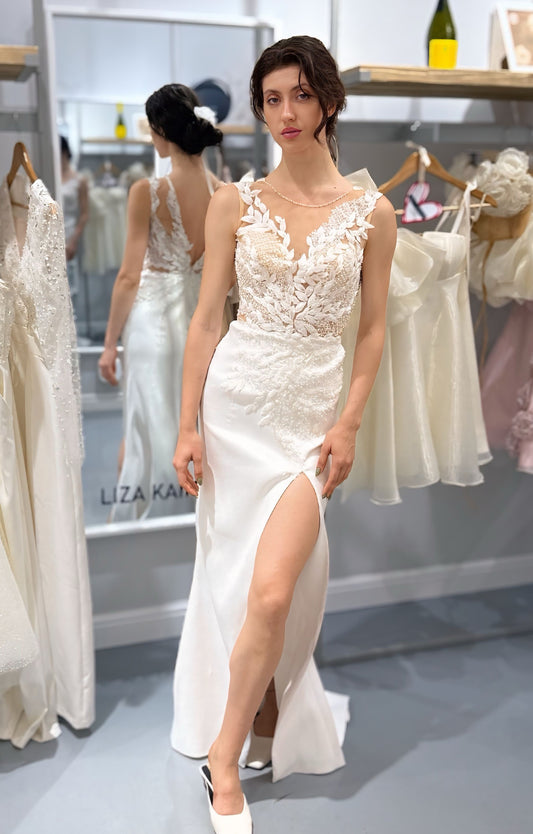 Изящна булчинска рокля с фина дантела. Идеална официална рокля за всяко събитие.