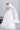 Задна част на булчинския модел Sabrina от LIZA KAIN bridal, показваща деликатната дантела и елегантния скрит цип. Този детайл осигурява безупречни контури и перфектно прилягане на силуета.