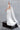 Елегантна булчинска рокля Ivy Embrace LIZA KAIN Bridal с ръчна бродерия от листа и перли върху корсета, отворен гръб и очертаваща силуета гладка падаща пола.
