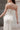 Официална булчинска рокля Margarita Lumiere LIZA KAIN Bridal с издължен корсет с връзки, бяла сатенена пола тип русалка и подвижен перлен колан.