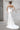 Булчинска рокля Galadriel Divine LIZA KAIN Bridal с издължен корсет декориран от ръчно нашита сребриста дантела, сърцевидно деколте и сатенена пола тип русалка.