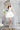 Къса сатенена булчинска рокля Daisy Belle Epoque от LIZA KAIN bridal с нежно романтично излъчване и модерна линия. Моделът съчетава класически корсет и къса обемна пола, които създават перфектно балансиран силует.