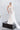 Официална булчинска рокля Rubelle от LIZA KAIN bridal, изработена от изискана дантела и обшита с хиляди перли и камъни. Моделът перфектно обгръща тялото и подчертава всяка извивка в изтънчен силует.