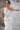 Официална булчинска рокля Galadriel Divine LIZA KAIN Bridal от две части с издължен корсет със сърцевидно деколте, ръчно нашита сребриста дантела и русалкова сатенена пола.