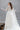Официално бяло болеро Juliette Royale LIZA KAIN Bridal от фин тюл, с висока яка, орнаментирано с ръчно нашита дантела и декоративни камъни.