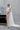 Релефни флорални мотиви върху булчинския модел Andromeda Starfall от LIZA KAIN bridal. Тези триизмерни елементи добавят изразителна текстура и подчертават женствения характер на дизайна.