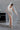 Детайл от фината прозрачна основа на сватбената рокля Andromeda Starfall от LIZA KAIN bridal. Върху материята са оформени прецизни орнаменти, които придават усещане за дълбочина и модерна кутюрна естетика.