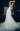 Елегантна булчинска рокля в стил официална рокля с дълбока цепка и шлейф.